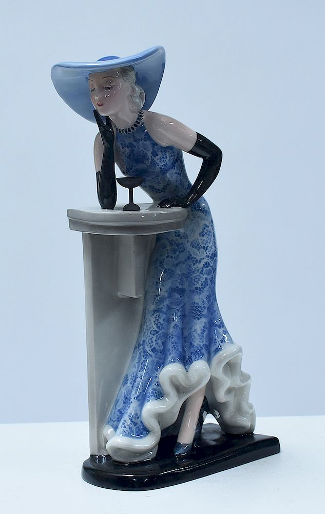 Appraisal: Goldscheider figure of Art Deco woman in blue hat Goldscheider