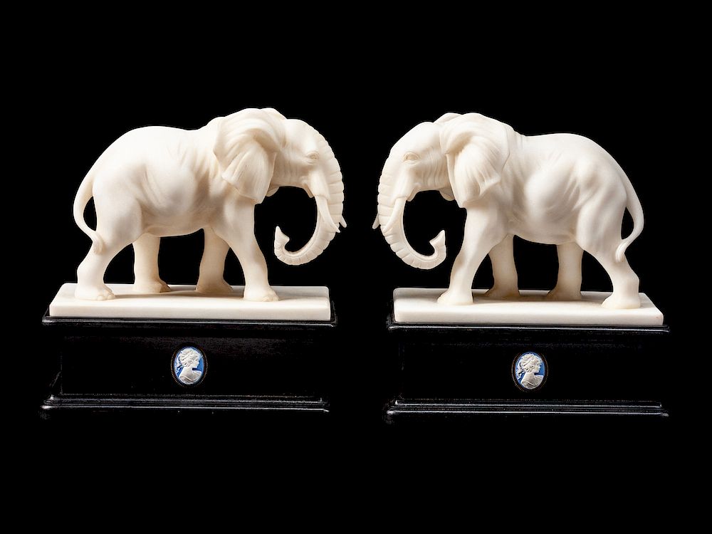 Appraisal: A Pair of Continental Composition Marble Elephants A Pair of