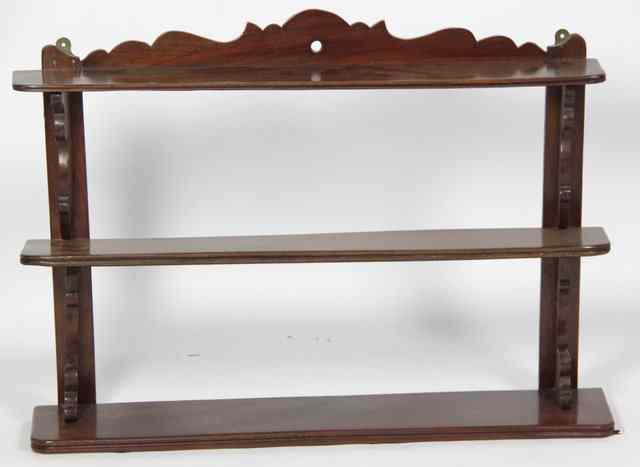 Appraisal: A set of Victorian hanging wall shelves with shaped cresting