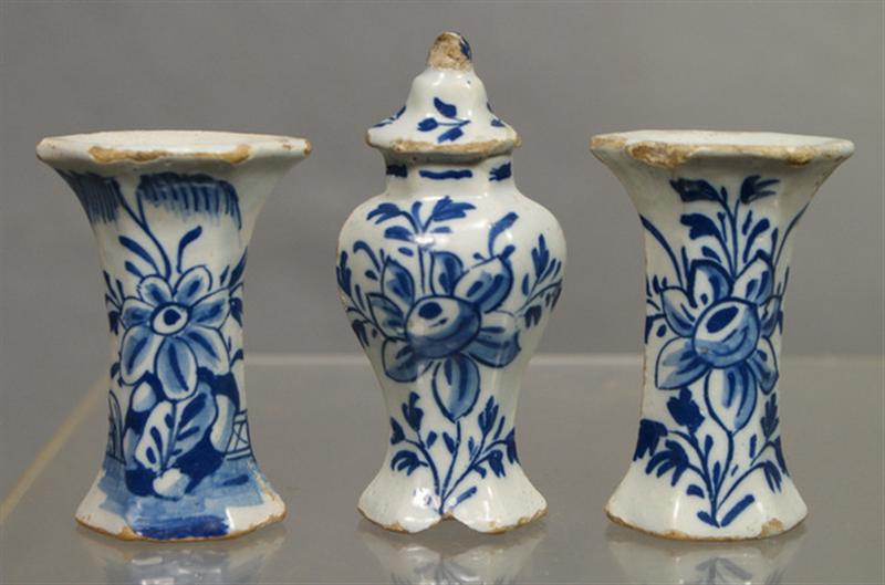 Appraisal: Delft pedestal salts blue floral decoration with a minature Delft