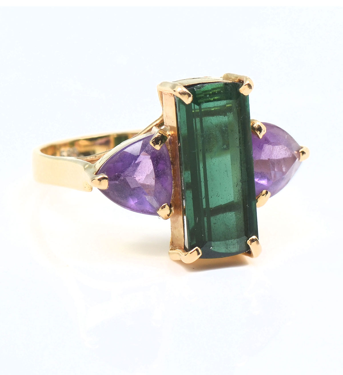 Appraisal: K TOURMALINE AMETHYST RING K yellow gold ring contain triangle