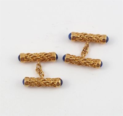 Appraisal: A pair of cufflinks by Boucheron The textured gold bars