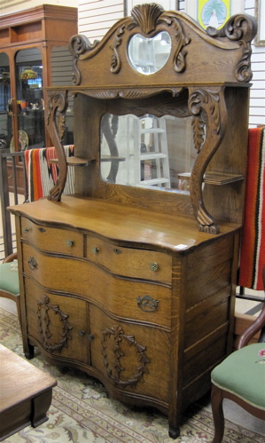 Appraisal: LATE VICTORIAN OAK SIDEBOARD American late th century having a