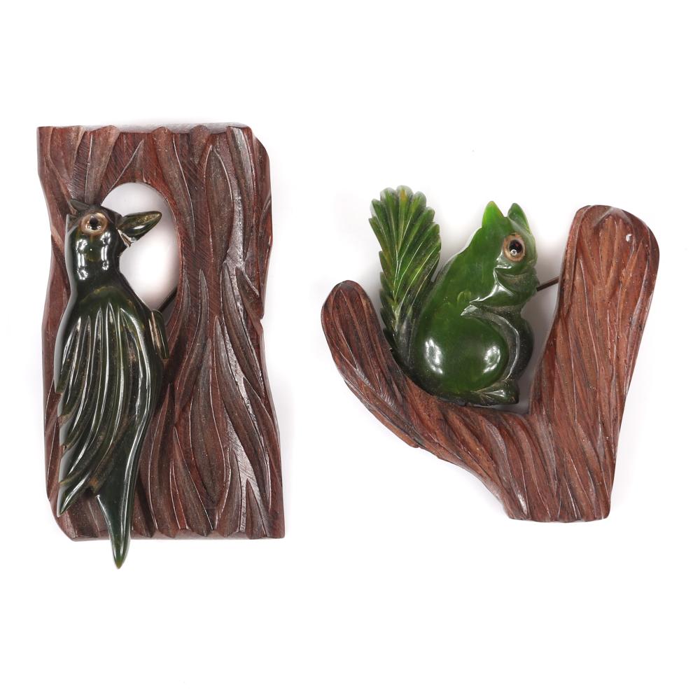 Appraisal: TWO VINTAGE BAKELITE WOODLAND ANIMAL PINS DEEPLY CARVED MOSS WOODPECKER