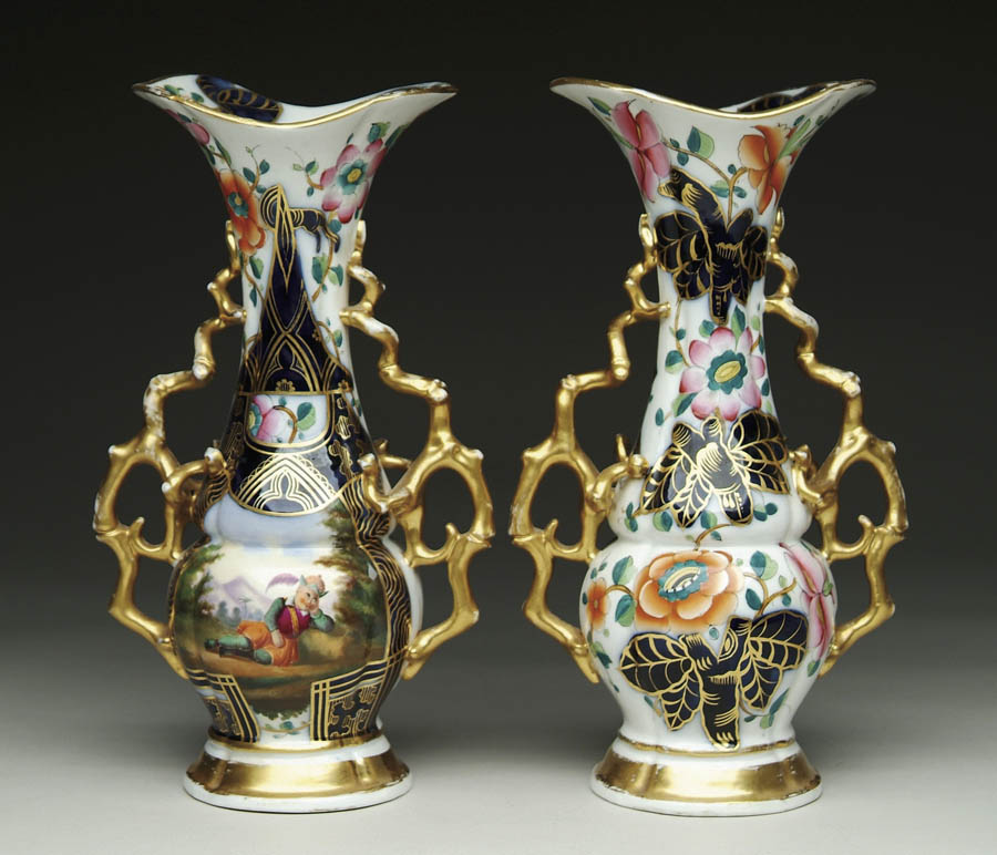 Appraisal: PAIR OF DECORATED PARIS VASES BY RUAUD Tapering bulbous vases