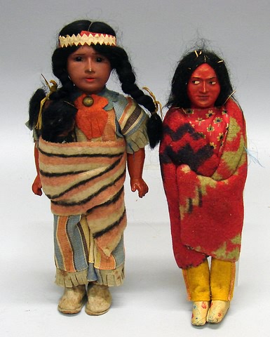 Appraisal: Black Ethnic Pair of Native American dolls ' female doll