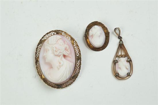 Appraisal: THREE ANGEL SKIN CORAL CAMEOS Late -early th century One