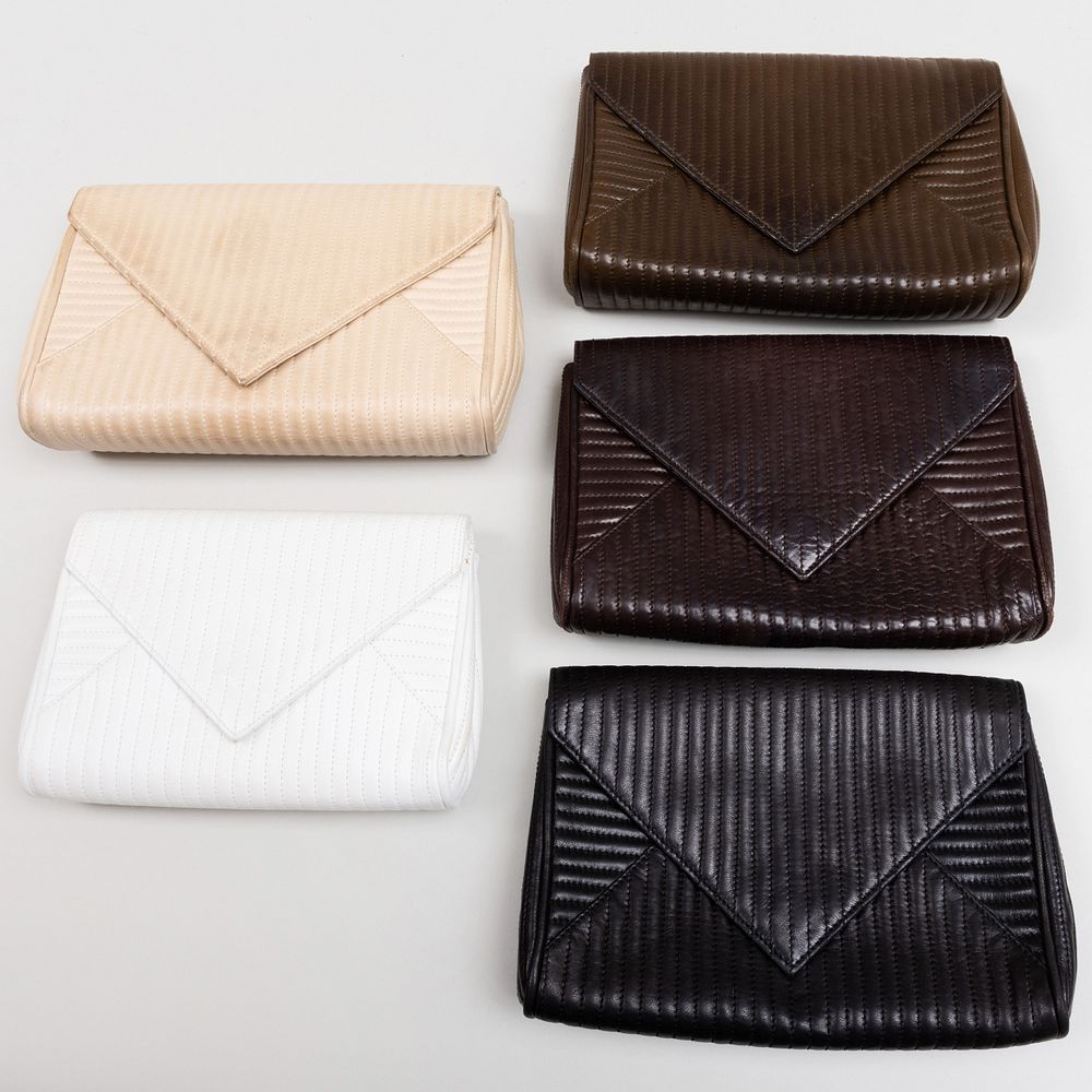 Appraisal: Group of Five Yves Saint Laurent Leather Clutches Each with