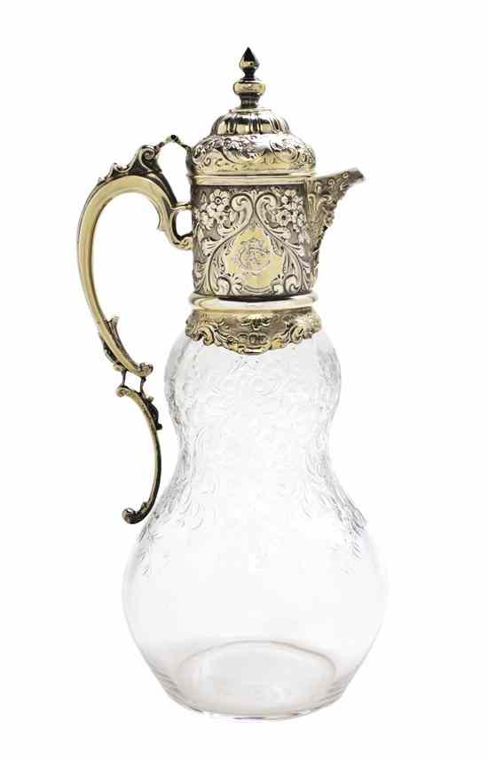 Appraisal: A Victorian Gilt Silver Mounted Engraved Glass Claret Jug Charles