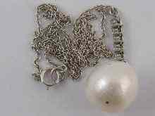 Appraisal: A pearl and diamond pendant the pearl approx mm