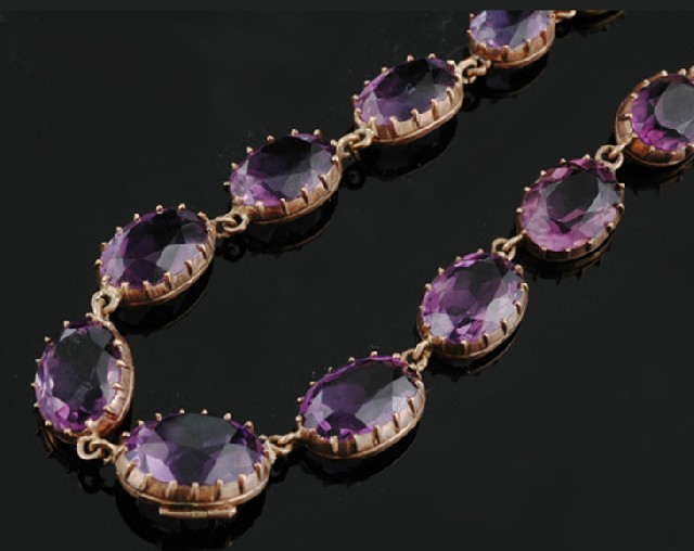 Appraisal: A Victorian amethyst riviere necklace Comprising thirty graduated oval faceted