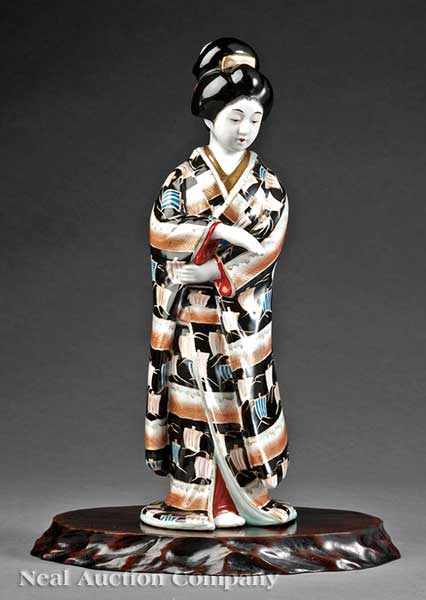 Appraisal: A Japanese Porcelain Figure of a Beauty Bijin standing figure