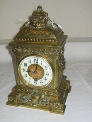 Appraisal: A FRENCH MANTEL CLOCK the cylinder movement with enamel dial