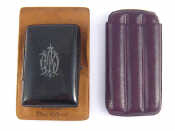 Appraisal: A leather triple cigar case and a tortoiseshell cigarette case