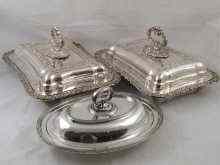 Appraisal: A pair of silver plate entree dishes and covers with