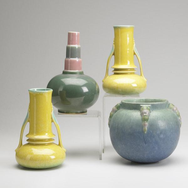 Appraisal: ROSEVILLE Four vases a pair of yellow Orian a pink