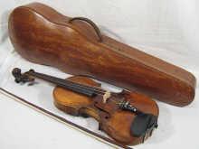 Appraisal: A violin and bow in shaped oak case the head