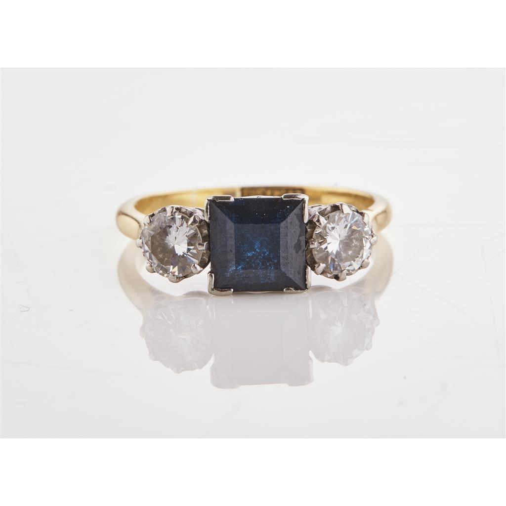 Appraisal: A sapphire and diamond three stone ring claw set with