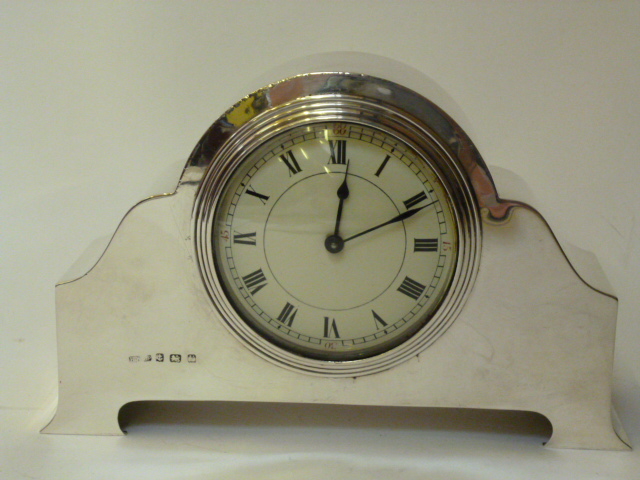 Appraisal: A MANTEL TIMEPIECE maker H Williamson Ltd Birmingham the white