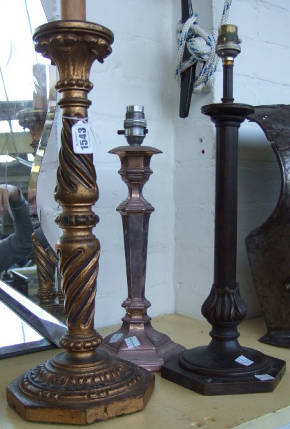 Appraisal: A carved wooden table lamp with gilt scroll work decoration