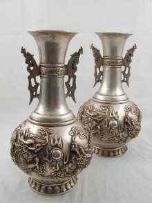 Appraisal: A pair of large cast white metal Chinese vases the