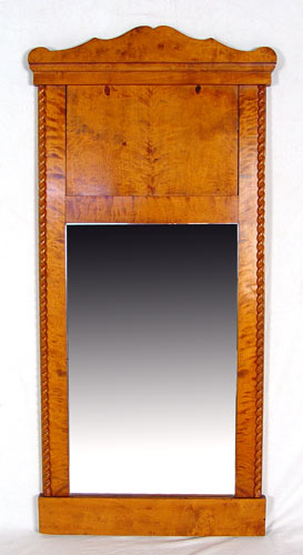 Appraisal: BIEDERMEIER MIRROR Shaped crest over burled panel rope twist carved