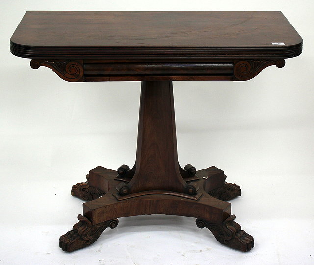 Appraisal: A WILLIAM IV MAHOGANY FOLD OVER TEA TABLE with concave