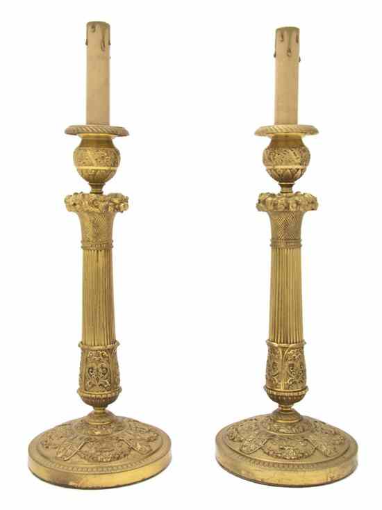 Appraisal: A Pair of Neoclassical Gilt Bronze Candlestick Lamps Louchet each