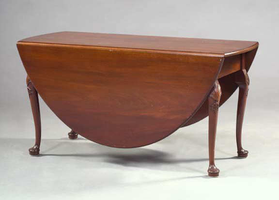 Appraisal: George III-Style Mahogany Drop-Leaf Table the top with rounded ends