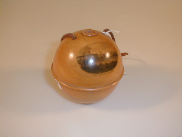 Appraisal: A Mauchline ware spherical string box with illustration of West