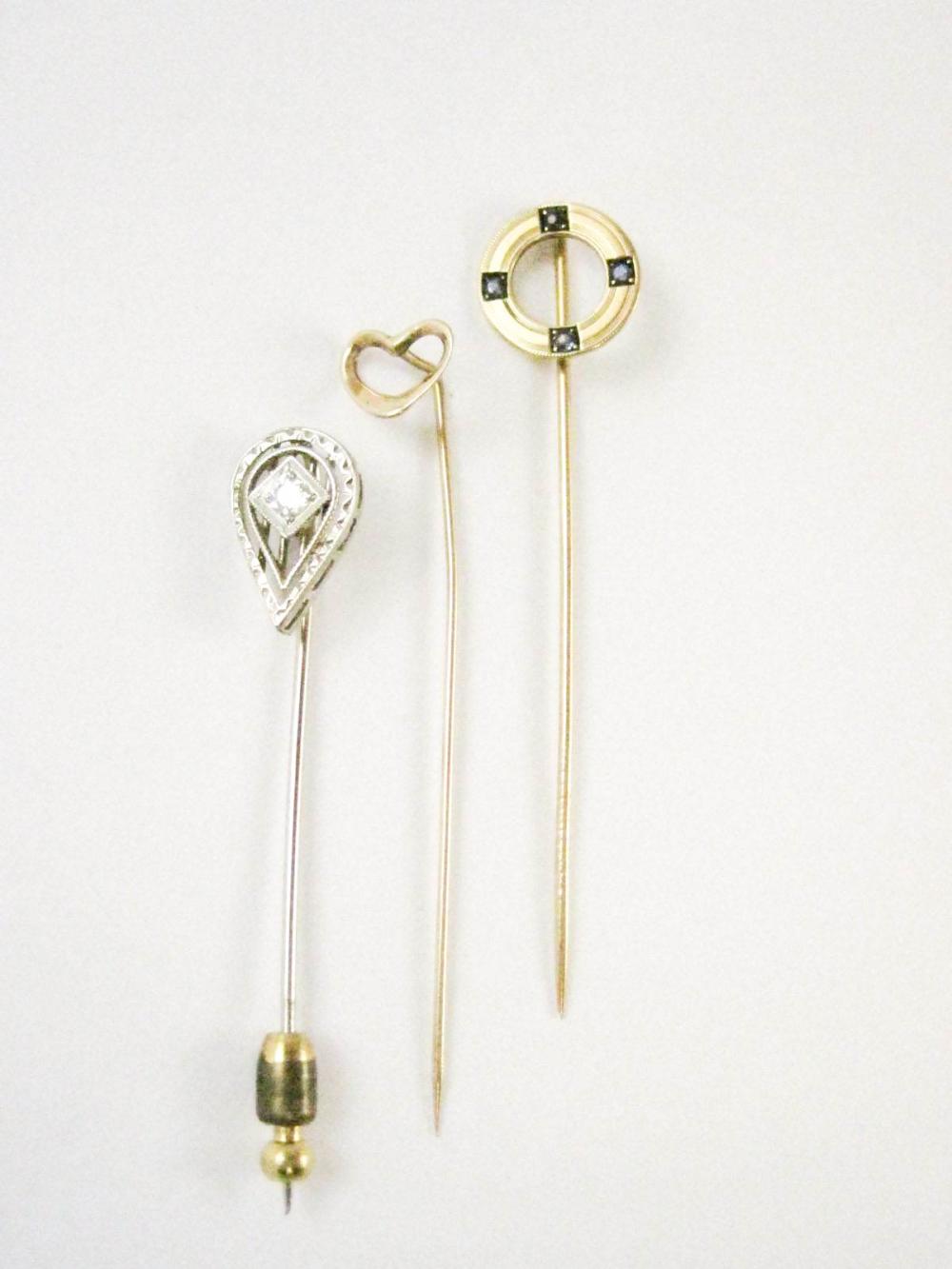 Appraisal: COLLECTION OF THREE GOLD STICK PINS including a - k