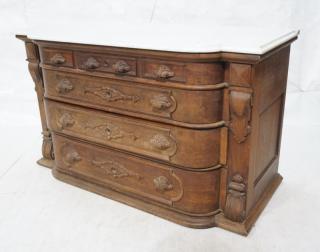 Appraisal: Victorian Marbletop Dresser Carved shell pulls Shaped marble top drawers