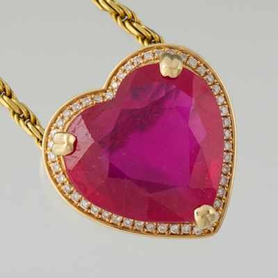 Appraisal: A Ladies' Ruby Heart and Diamond Pendant on Chain k