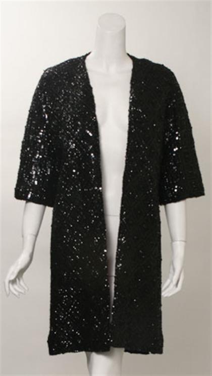 Appraisal: Two black beaded evening coats s One floor length with