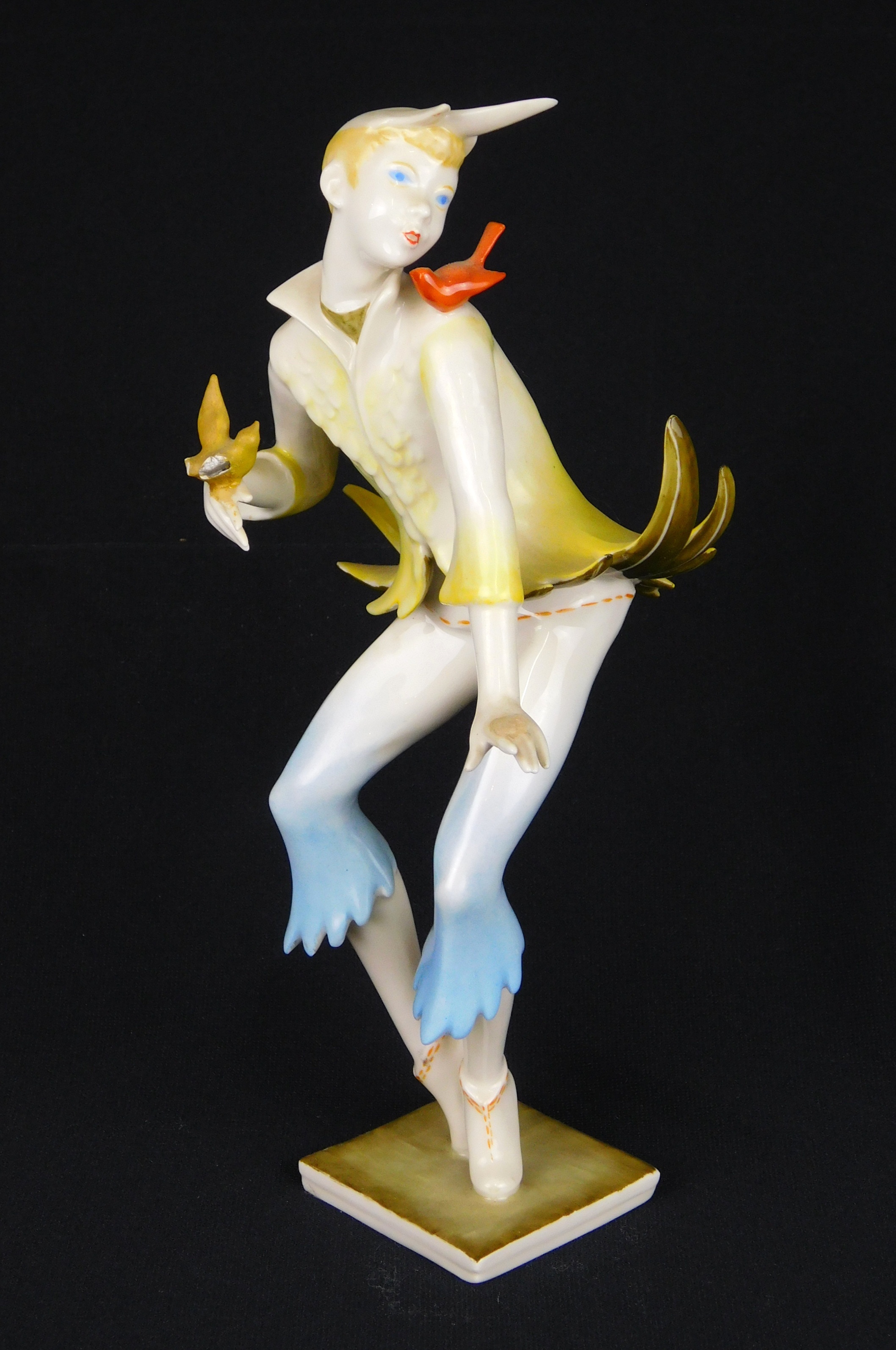 Appraisal: Hutschenreuther hand-painted porcelain figurine Figure with Bird mark and paper