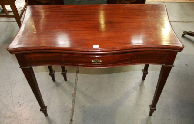 Appraisal: A George III mahogany card table with drawer later cm