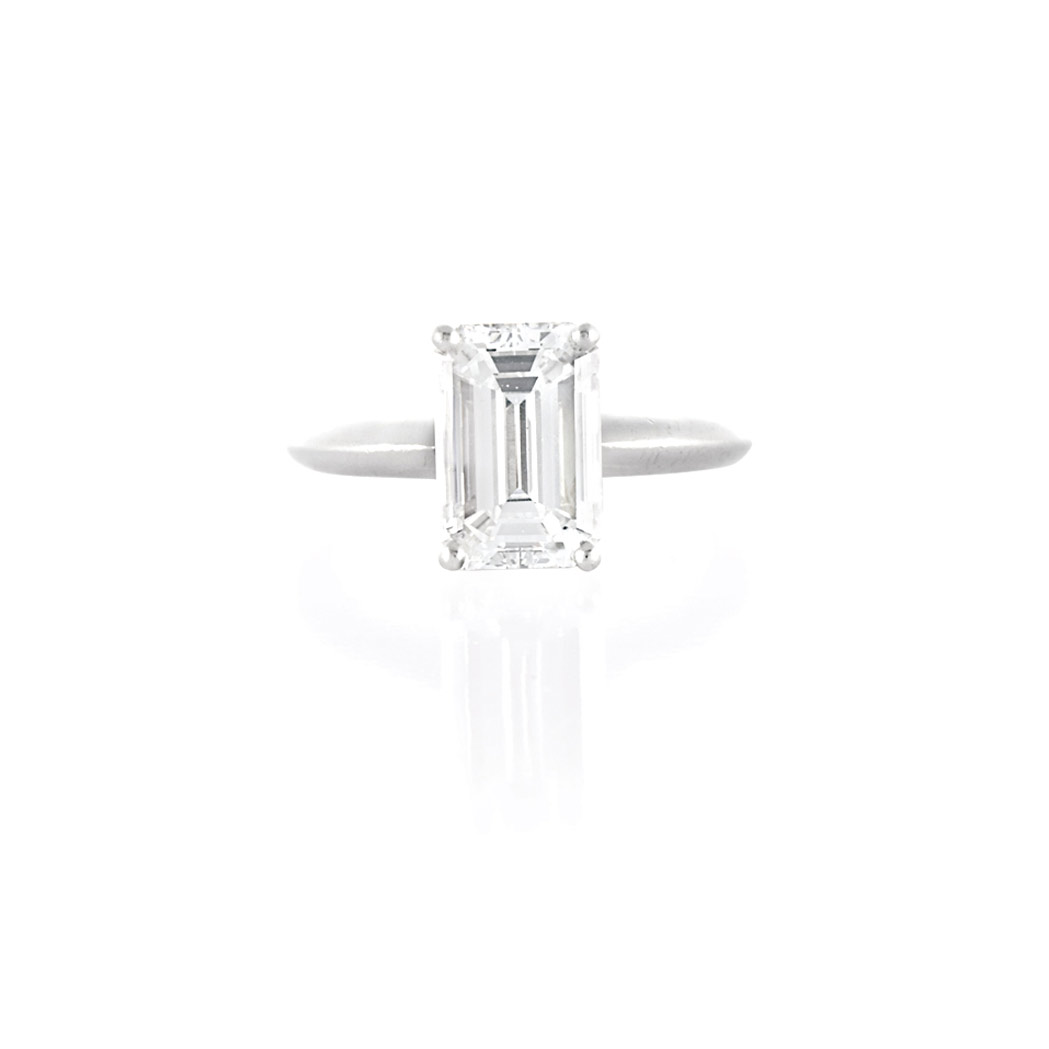 Appraisal: Platinum and Diamond Ring Centering one emerald-cut diamond approximately cts