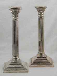 Appraisal: A fine pair of hallmarked silver Corinthian column candlesticks London