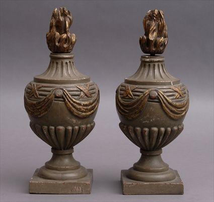 Appraisal: PAIR OF ITALIAN NEOCLASSICAL-STYLE CARVED PAINTED AND PARCEL-GILT FINIALS Each