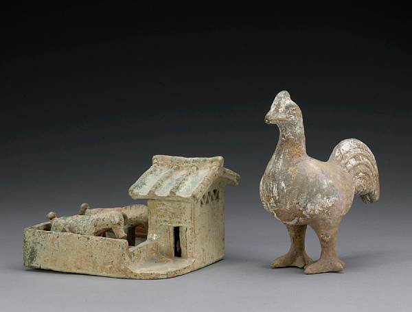 Appraisal: Two pottery funerary models Han Dynasty The first of a