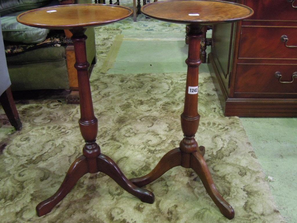 Appraisal: A pair of Georgian style hardwood occasional tables with circular