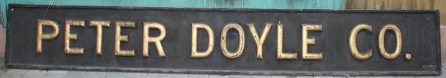 Appraisal: TH CENTURY PETER DOYLE CO WOODEN SIGN WITHRAISED HAND CARVED