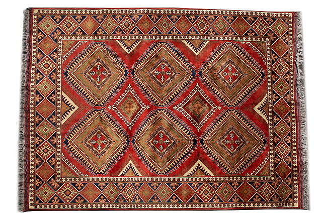 Appraisal: A LATE TH CENTURY MIDDLE EASTERN RED GROUND RUG with