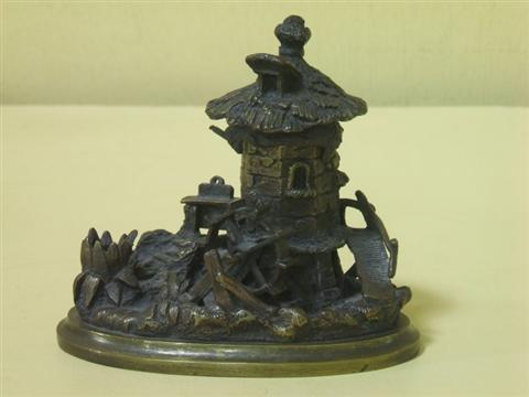 Appraisal: CONTINENTAL BRONZE INKWELL Probably th century cast as a mill