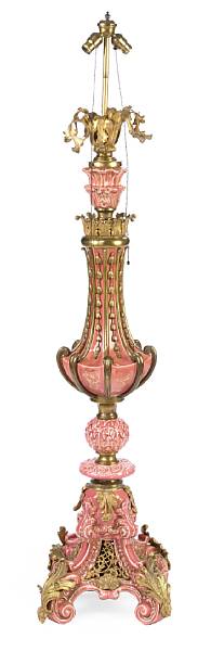 Appraisal: A Rococo style parcel gilt ceramic floor lamp height to