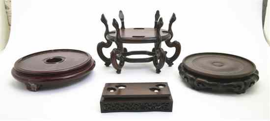 Appraisal: A Group of Five Chinese Carved Wood Stands of various