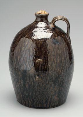 Appraisal: Alkaline glaze ovoid jug mottled and runny brown and black