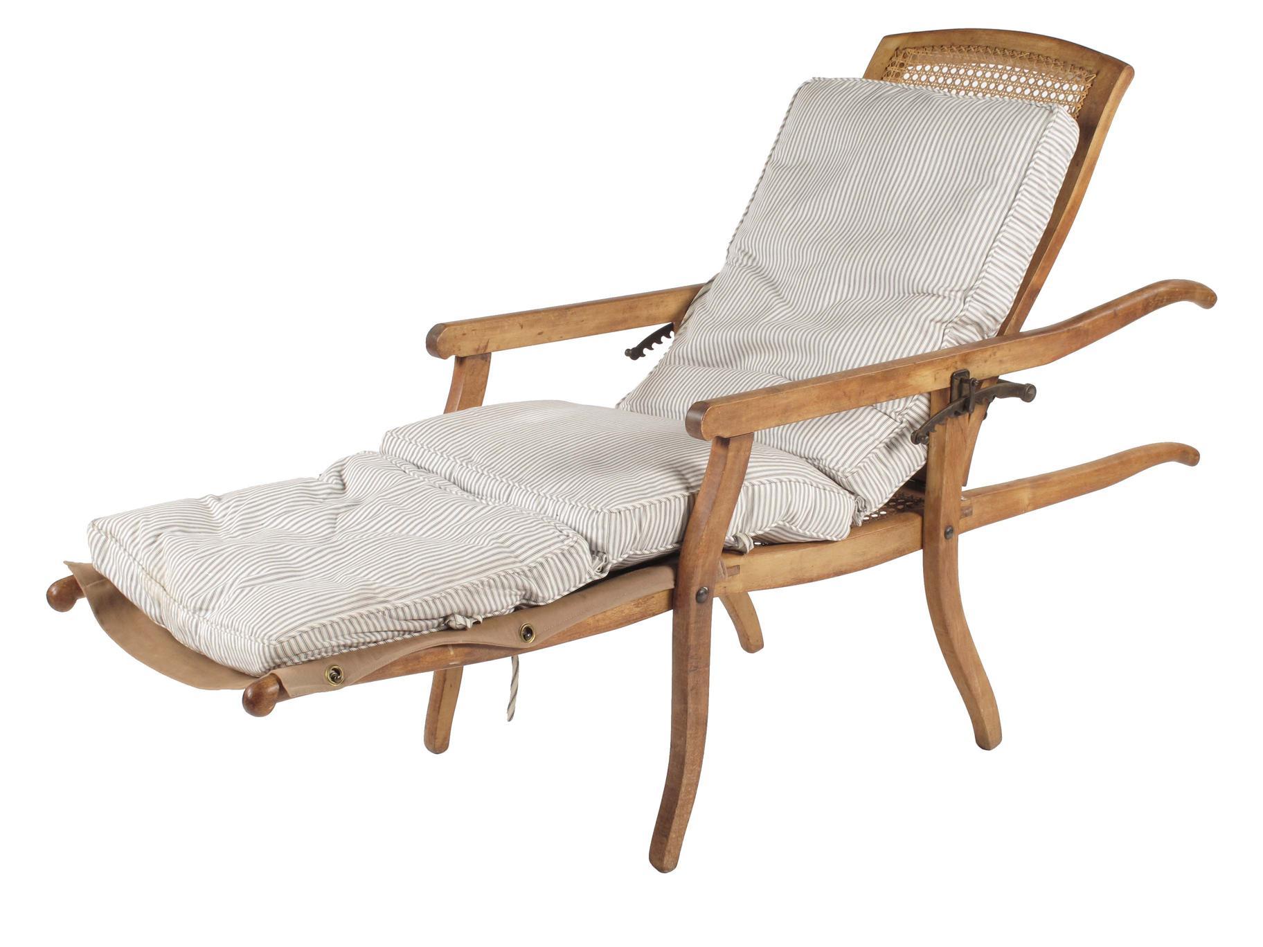 Appraisal: A German beechwood and cane campaign lounger by Kohler amp