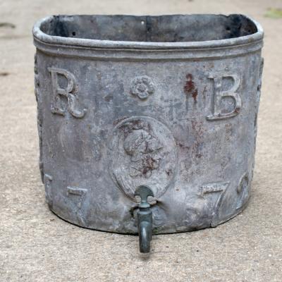 Appraisal: An th Century half-round lead cistern initialled RB and dated