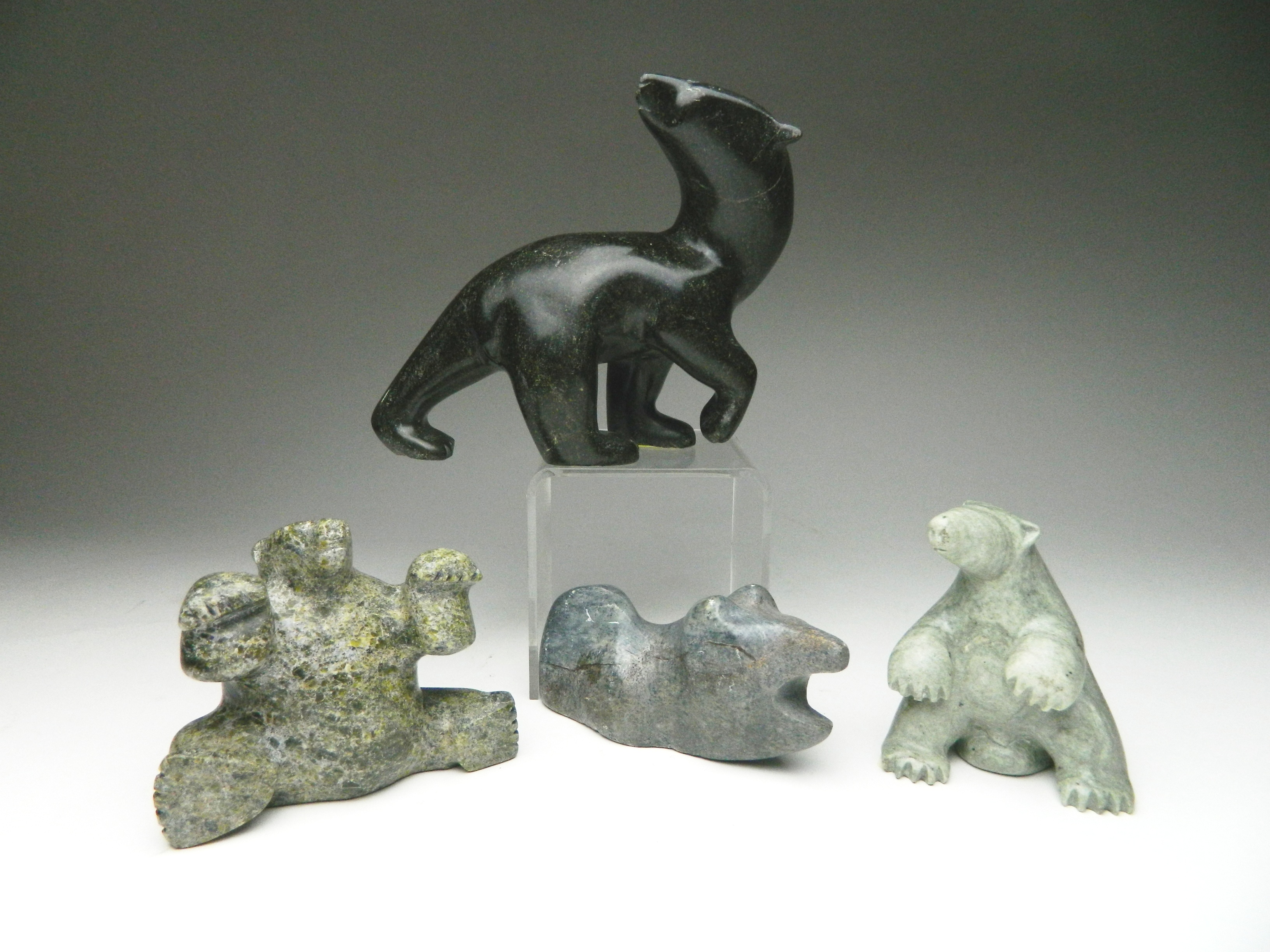 Appraisal: Inuit 'Bear' stone carvings Anita Issaluk Chsterfied ''h Al Pootoogook